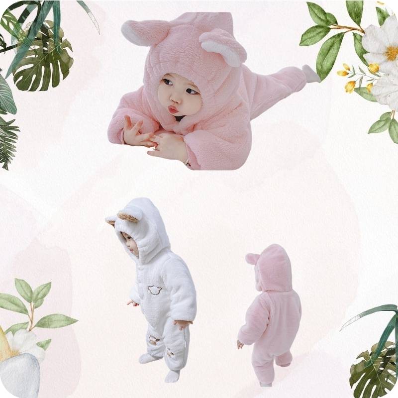 Collage of a baby in pink and white animal-themed onesies with decorative elements.