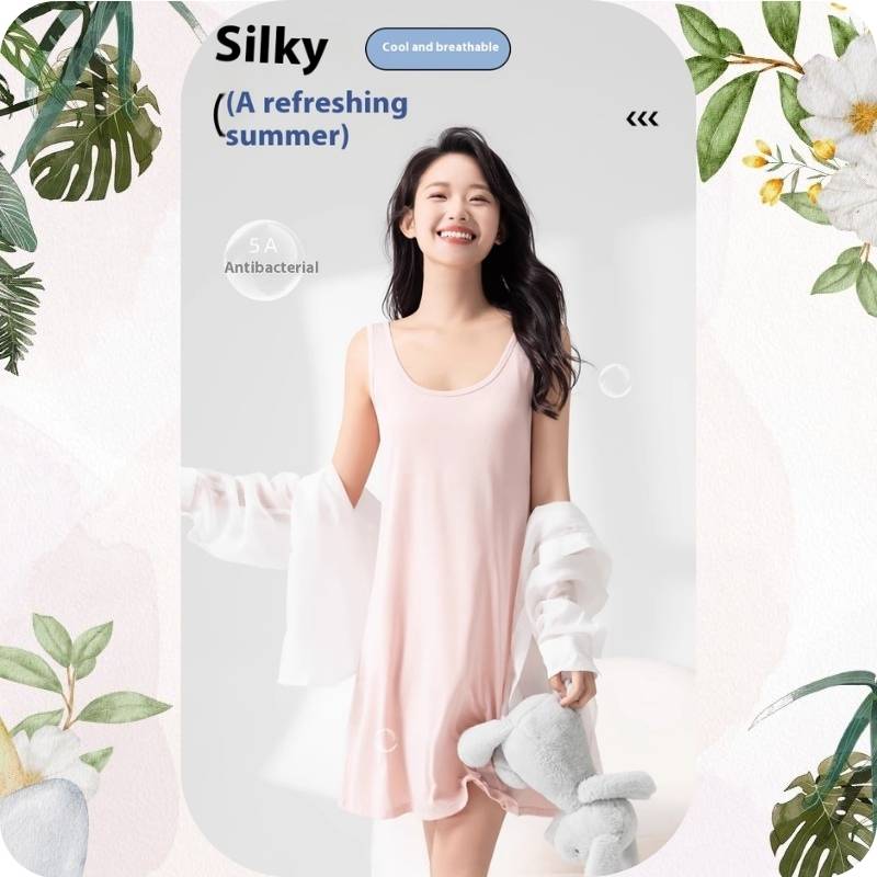 Woman wearing a pink nightgown with 'Silky' branding and text on a white background with greenery.