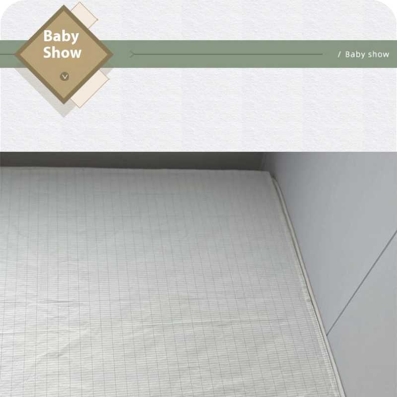 Soft baby bedsheet in neutral tones, highlighting premium fabric and grounding benefits for comfort and wellness.