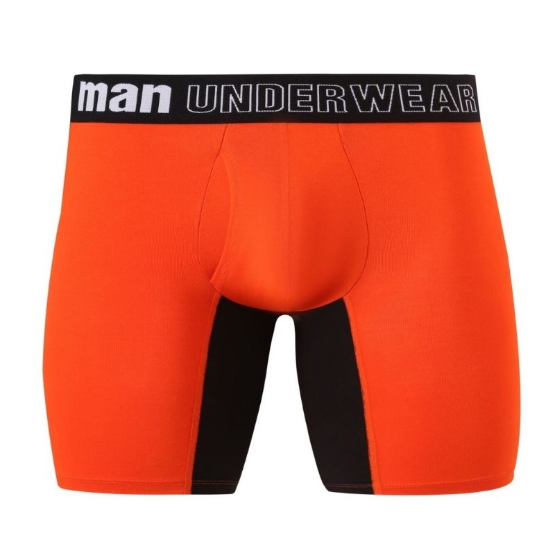 Close-up of men's orange and black bamboo fiber pajama pants highlighting breathable weave, comfort-fit stitching, and hypoallergenic fabric texture.