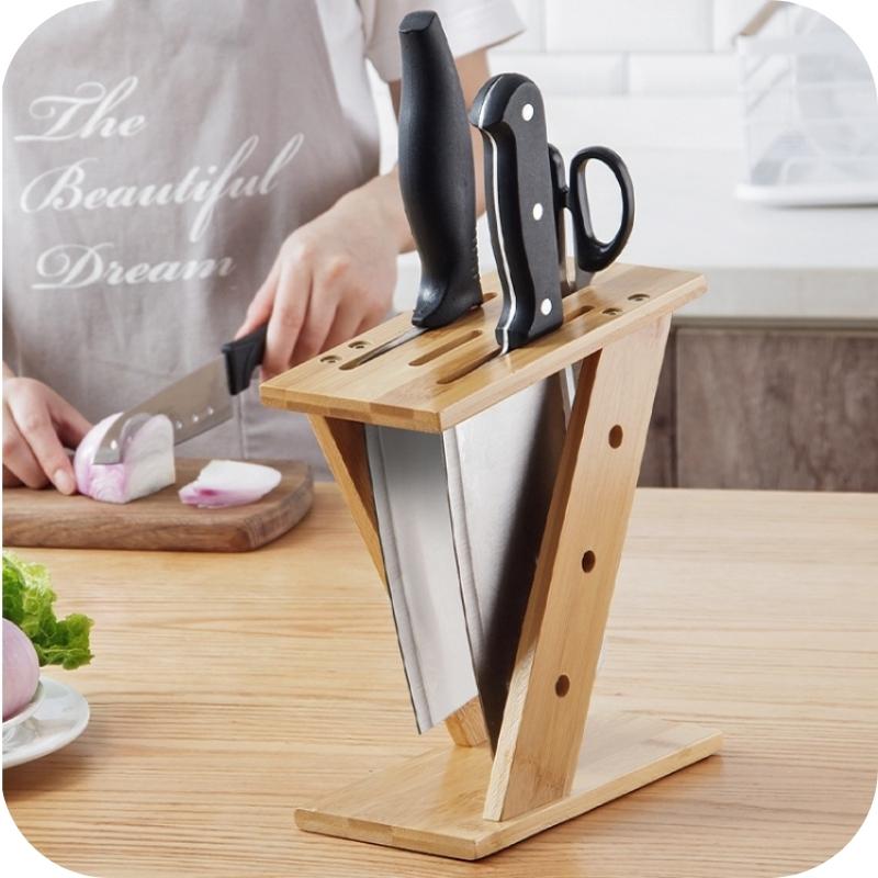 Showing the Side View of the Bamboo Kitchen Table Model Knife and Scissor Holder on a table