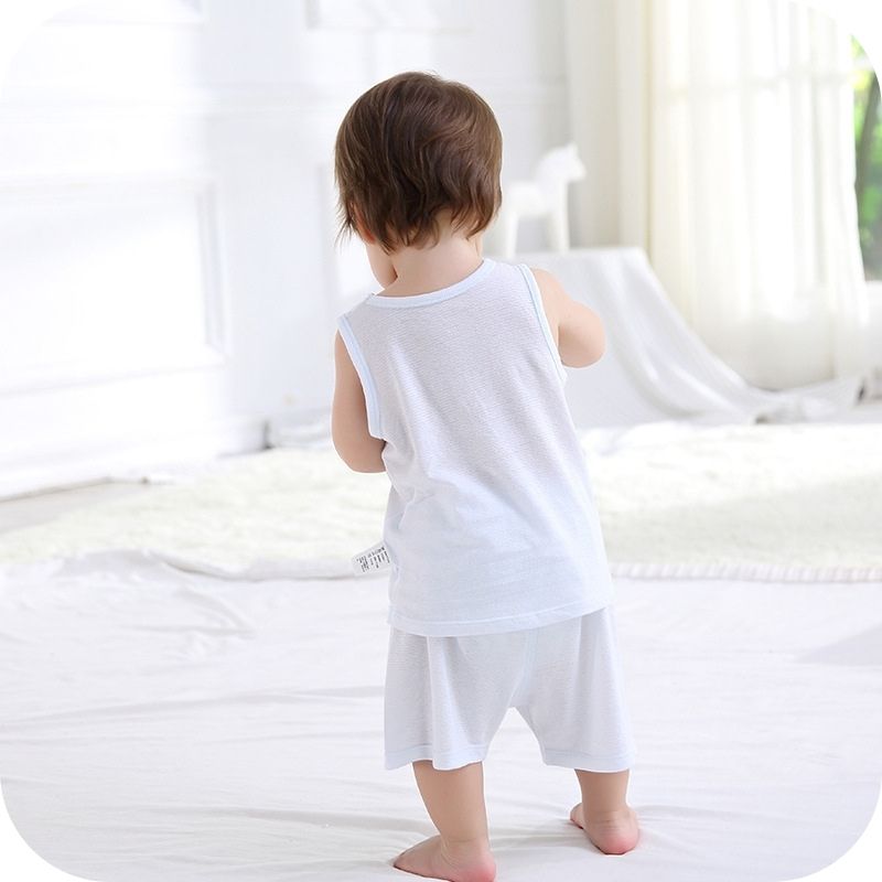 Showing a Back View of a boy wearing the Bamboo Fiber Toddler Vest Suit