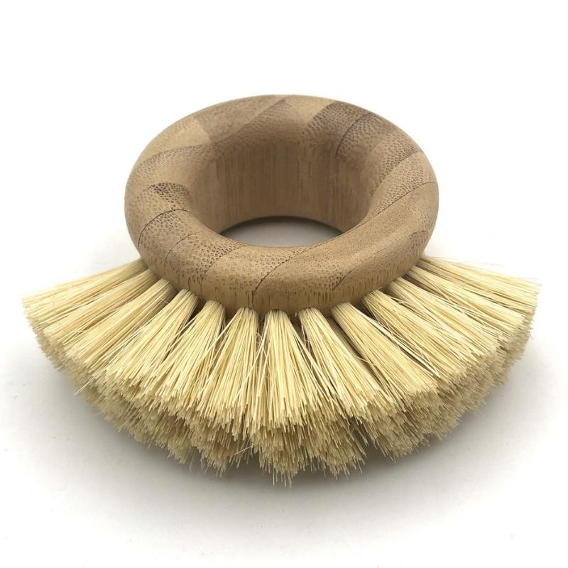 Showing the Bamboo Wood and Sisal Kitchen Cleaning Brush Lying Flat