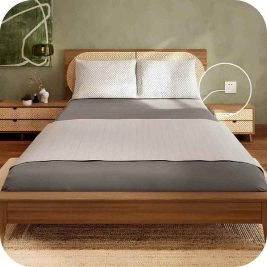 Grounding fitted bed sheet with cotton silver fiber displayed on a neatly made bed, enhancing sleep quality and overall wellness.