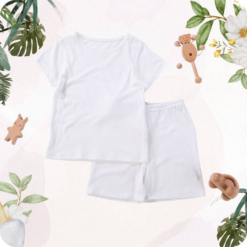 Beige t-shirt and shorts set with decorative elements on a light background