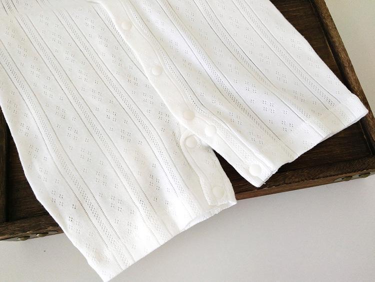 Showing a Closeup of the buttons on the Bamboo Fiber Baby Clothes One Piece