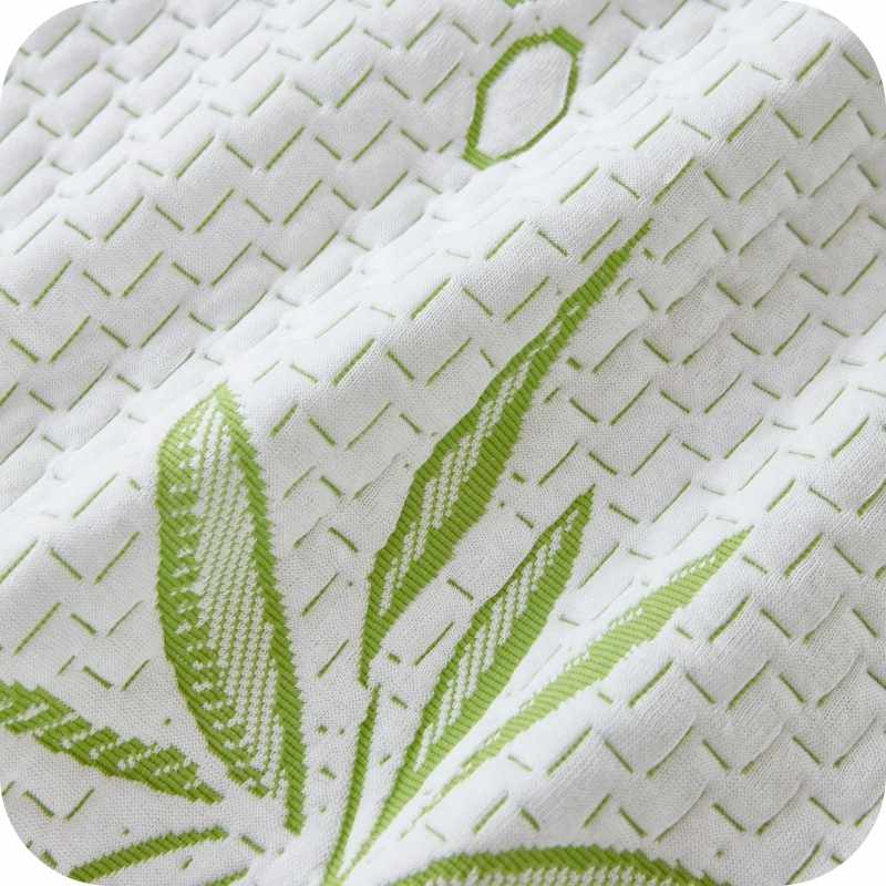 Closeup quality of Fitted white mattress protector cover with a bamboo fiber air layer and a floral pattern