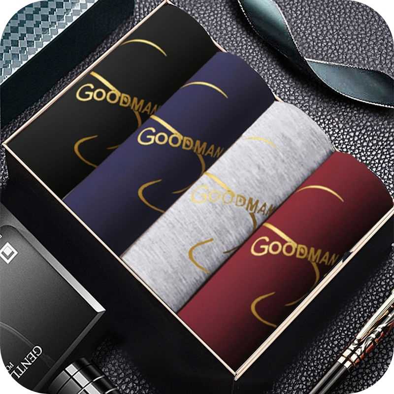 Four different pairs of men's underwear. The underwear features various colors and geometric designs.