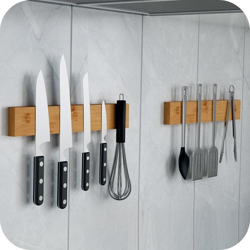 You can Hang Utensils or knives on the Wall Mounted Kitchen Bamboo Magnet Knife Holder