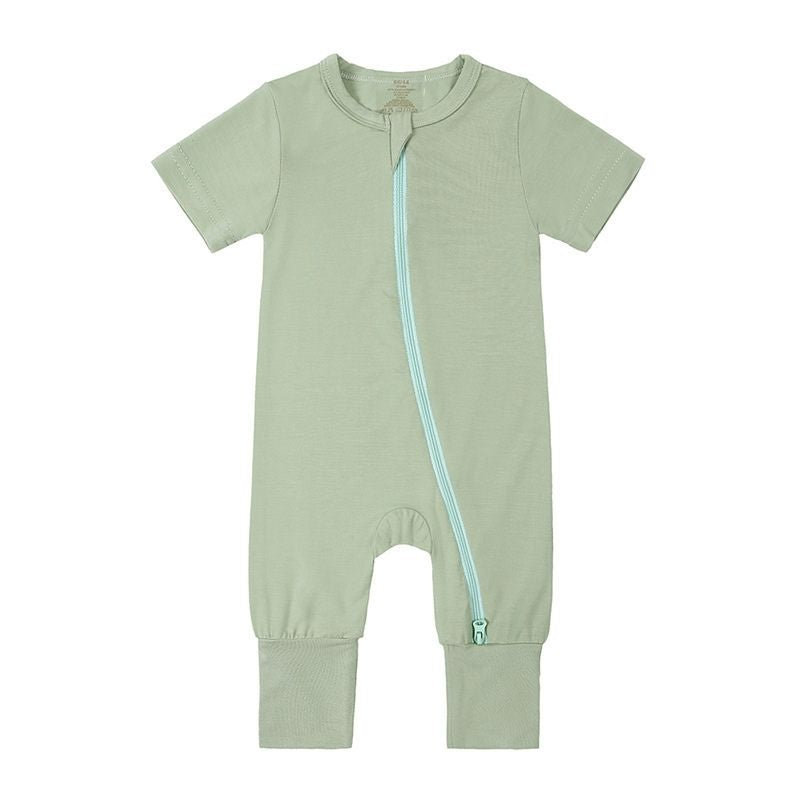 Light green bamboo baby jumpsuit with short sleeves—soft, breathable, and skin-friendly; laid flat to highlight color and texture.