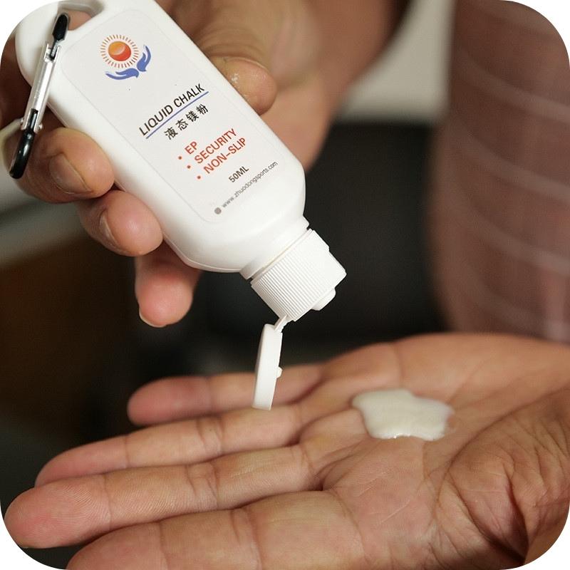 Showing a man pouring from the Liquid Magnesium Anti Slip Powder Bottle