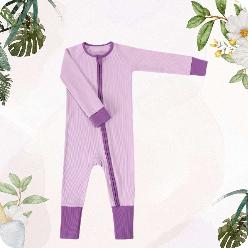 Purple baby onesie with a zipper on a white background with green leafy elements.