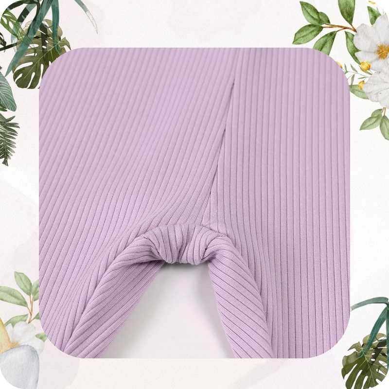 Crotch of pajamad on a white background with greenery and flowers.