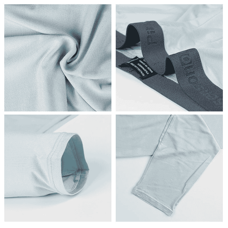 Close-up of men's bamboo fiber pajama pants showcasing breathable weave, moisture-wicking texture, hypoallergenic finish, and comfort-fit stitching in sky blue fabric.