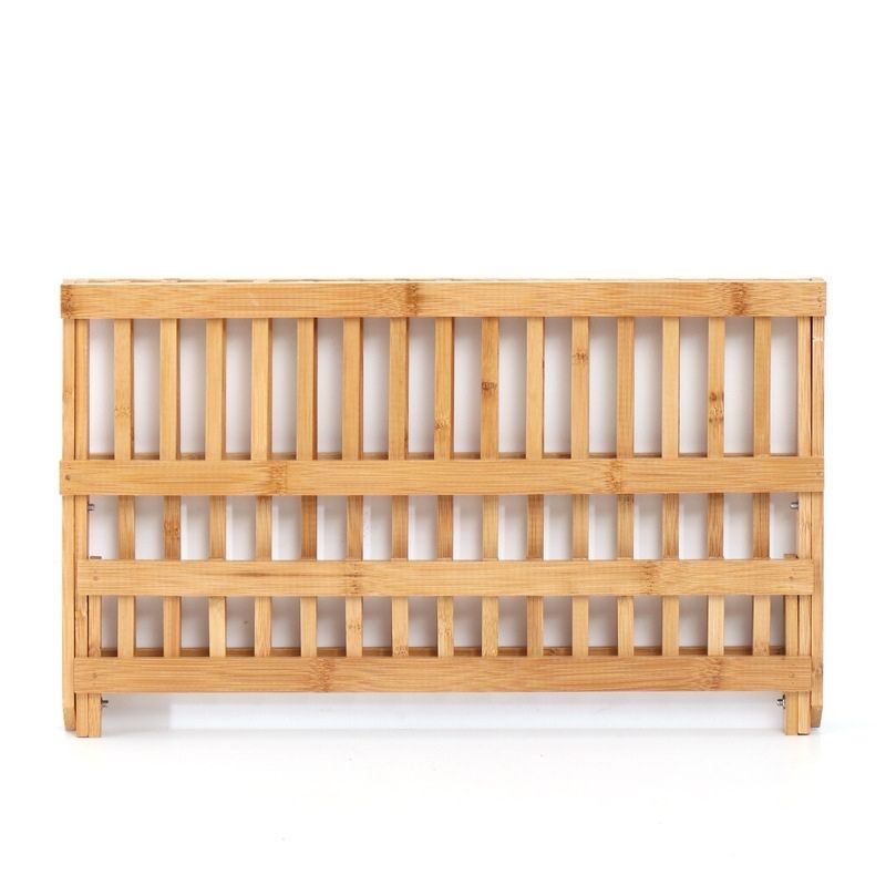 Showing The Folded-up Bamboo Kitchen Dish Drain and Ventilation Rack against a Wall