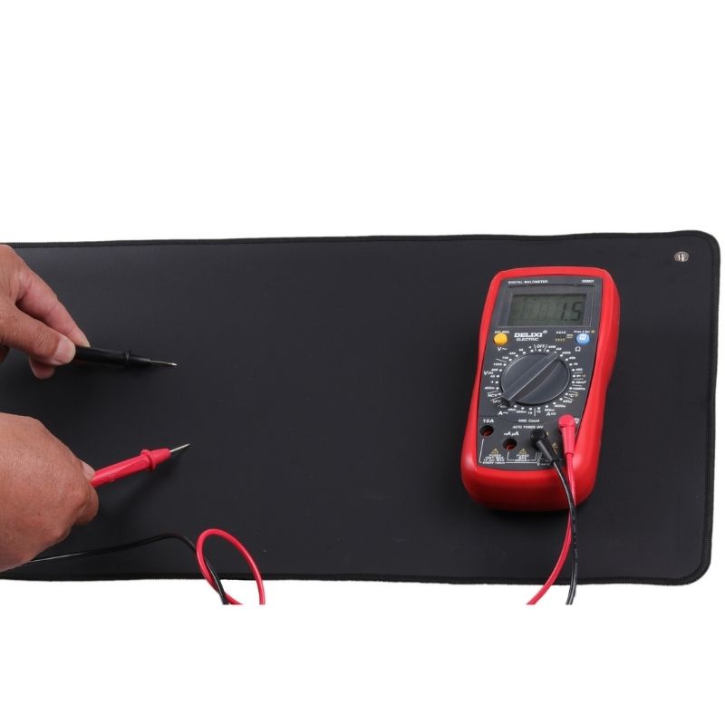 Measuring the electrical conductivity of the Conductive Leather Grounding Yoga Mat Set using a meter